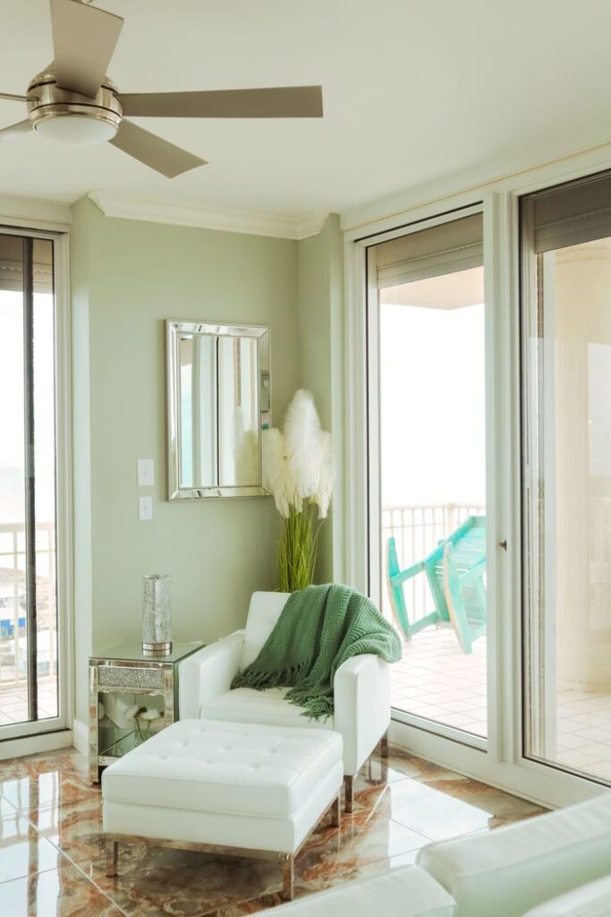 pexels photo 19410748 Stylish modern apartment with a cozy armchair and large windows. Perfect for relaxation and design inspiration.