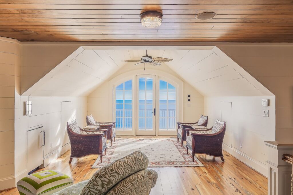 pexels photo 276508 Bright and luxurious loft overlooking the ocean, featuring modern furniture and design.
