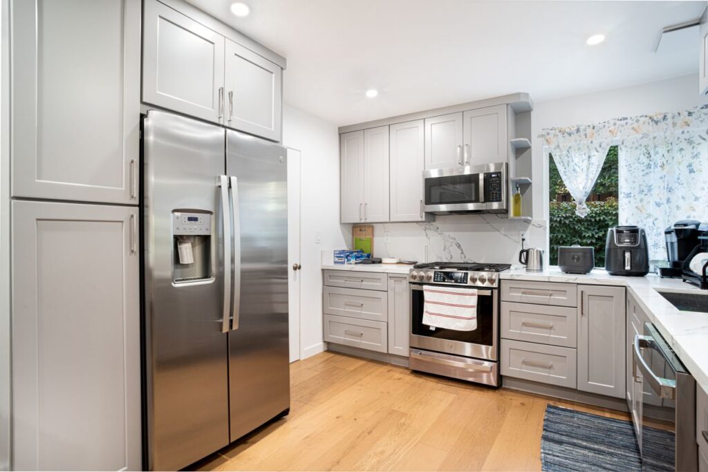 pexels photo 28272321 Contemporary kitchen interior featuring stainless steel appliances and sleek cabinetry.