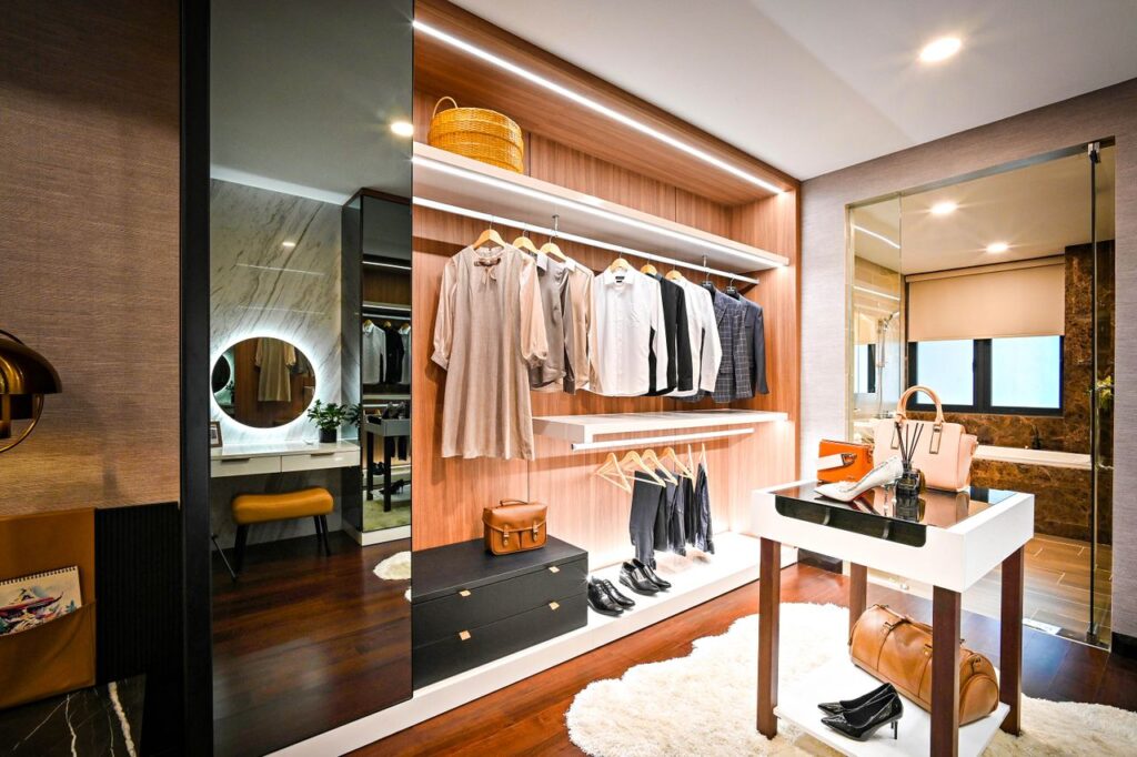 pexels photo 6670657 Elegant and organized walk-in closet featuring stylish clothing and accessories.
